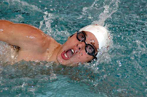 Bunn defends league girls swimming crown