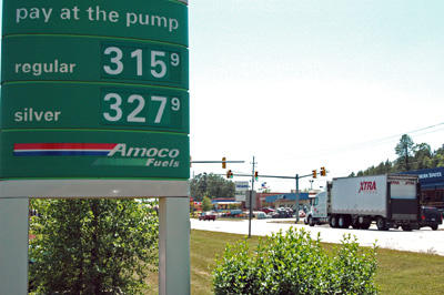 Gas prices hit high, dip just a bit locally